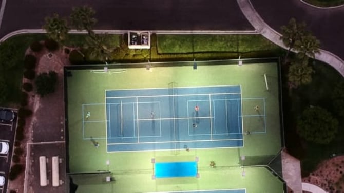 2 pickleball courts set on a tennis court