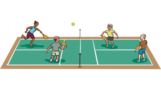 Four mature people play pickleball game